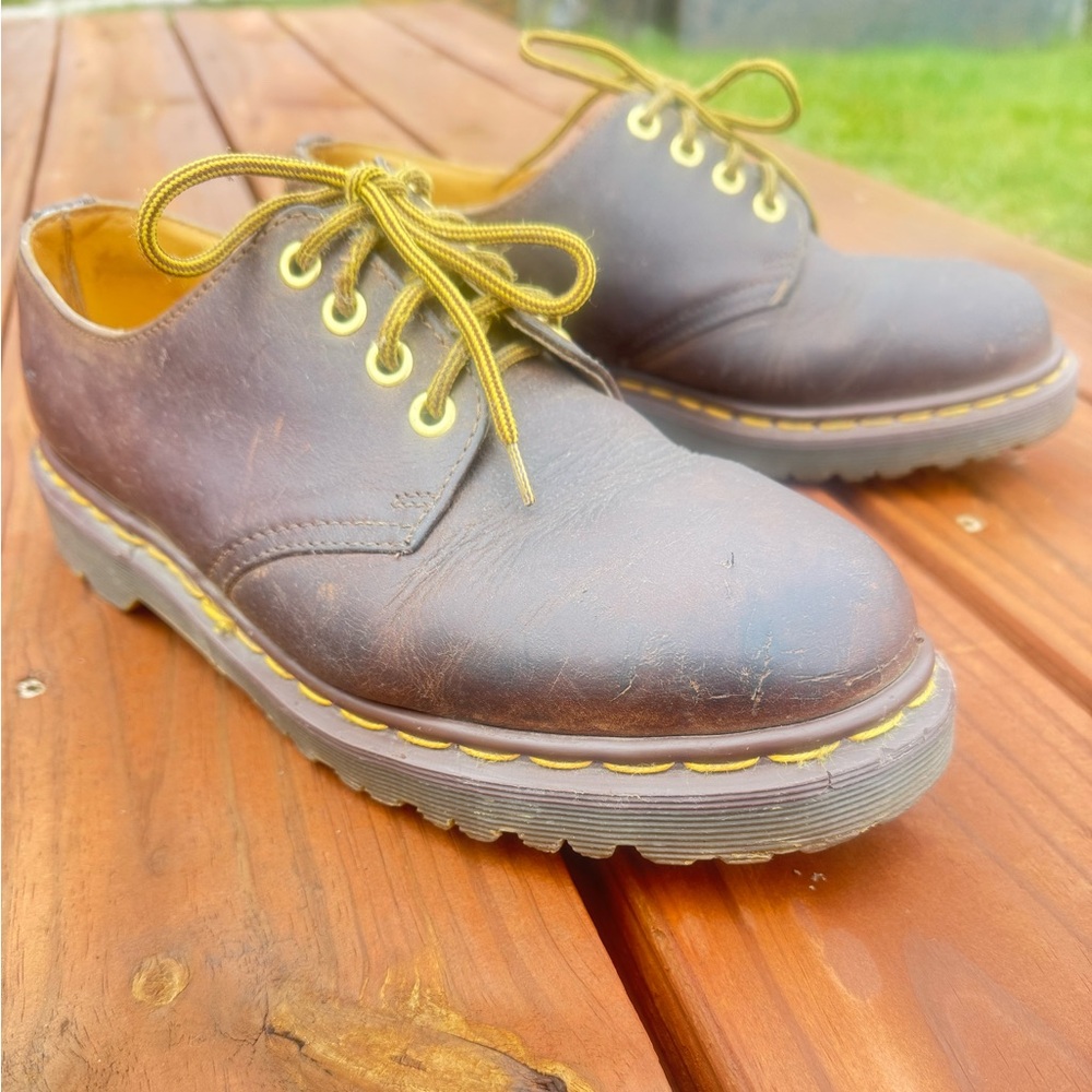 Dr. Martens Brown Leather Oxfords with Yellow Laces

Mens size: 8